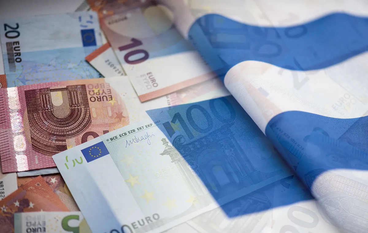 Γράφημα οικονομικής ανάπτυξης και ελληνική σημαία