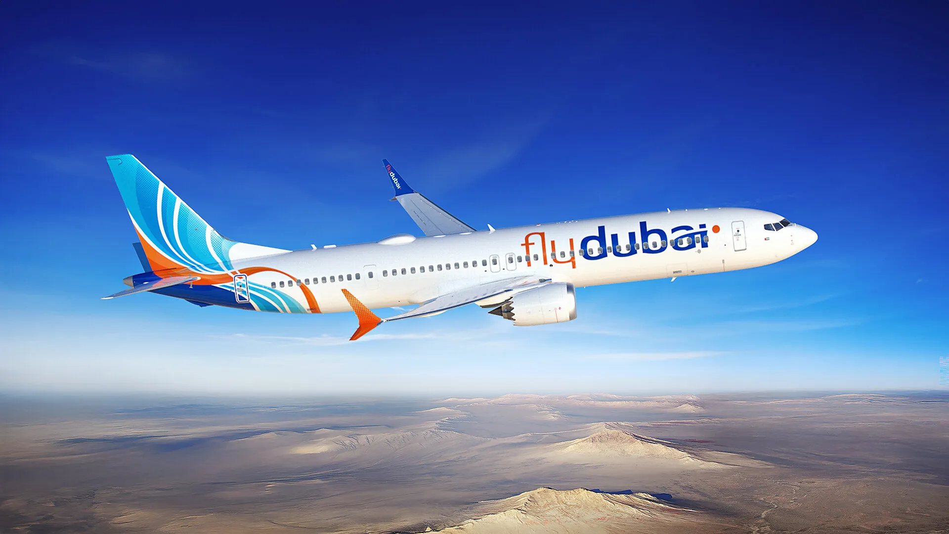 Αεροσκάφος Flydubai σε πτήση πάνω από σύννεφα